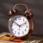 Quartz Metallic Bronze and Silver colour metal Clock